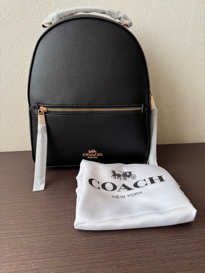 R*様 COACH ブラック バックパック