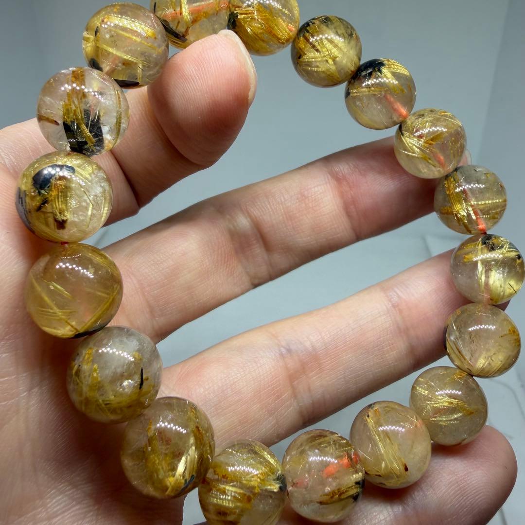 □125ブレスレット太陽放射ゴールドタイチン ルチルクォーツ 金運 z1965□