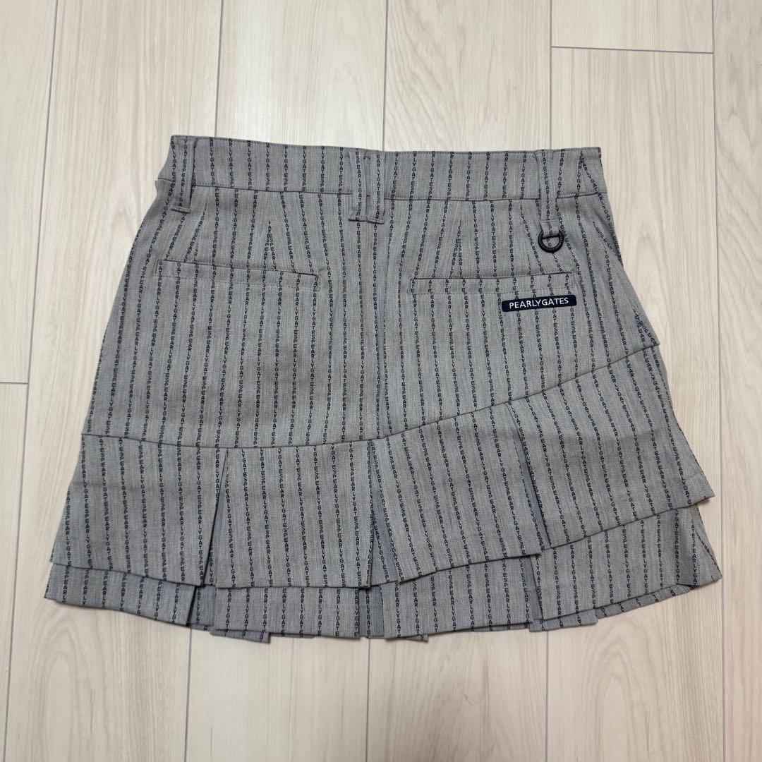 新品タグ付き パーリーゲイツ スカート グレー フリル ストレッチ ストライプ