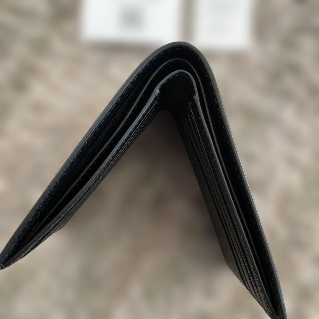 新品未使用　49500円 COACH 二つ折り