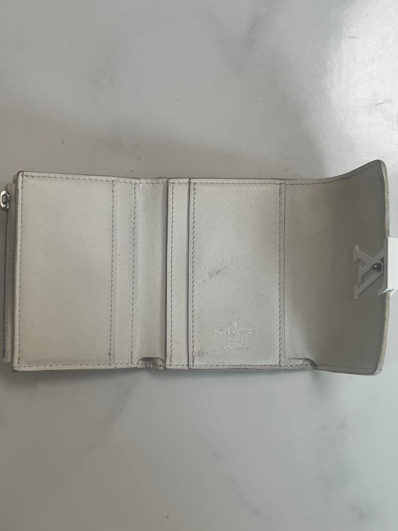 ルイヴィトン ポルトフォイユ カプシーヌ XS トリヨンレザー 三つ折り財布