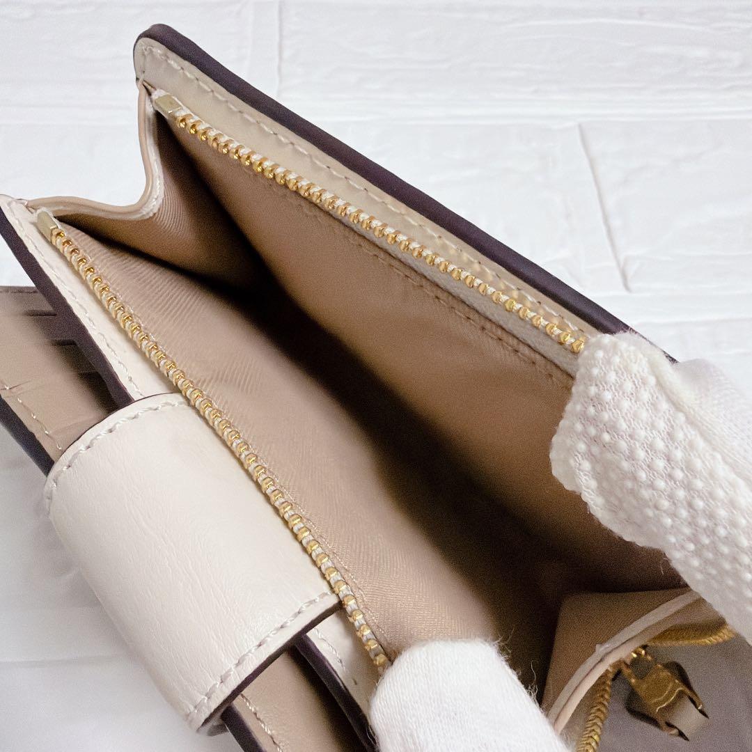 コーチ 二つ折り財布 シグネチャー ベージュ 白 coach