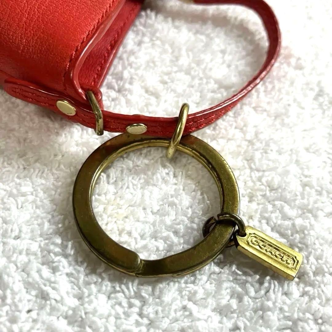 コーチ　レザー レッド ミニ小物入れ　タッセル付き　キーチャーム