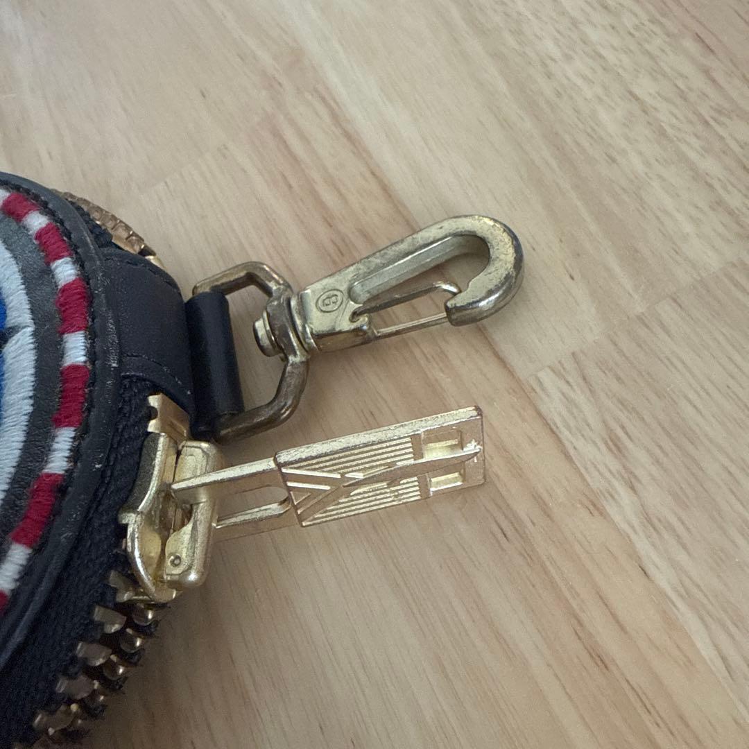 black means ケース サークルポーチ