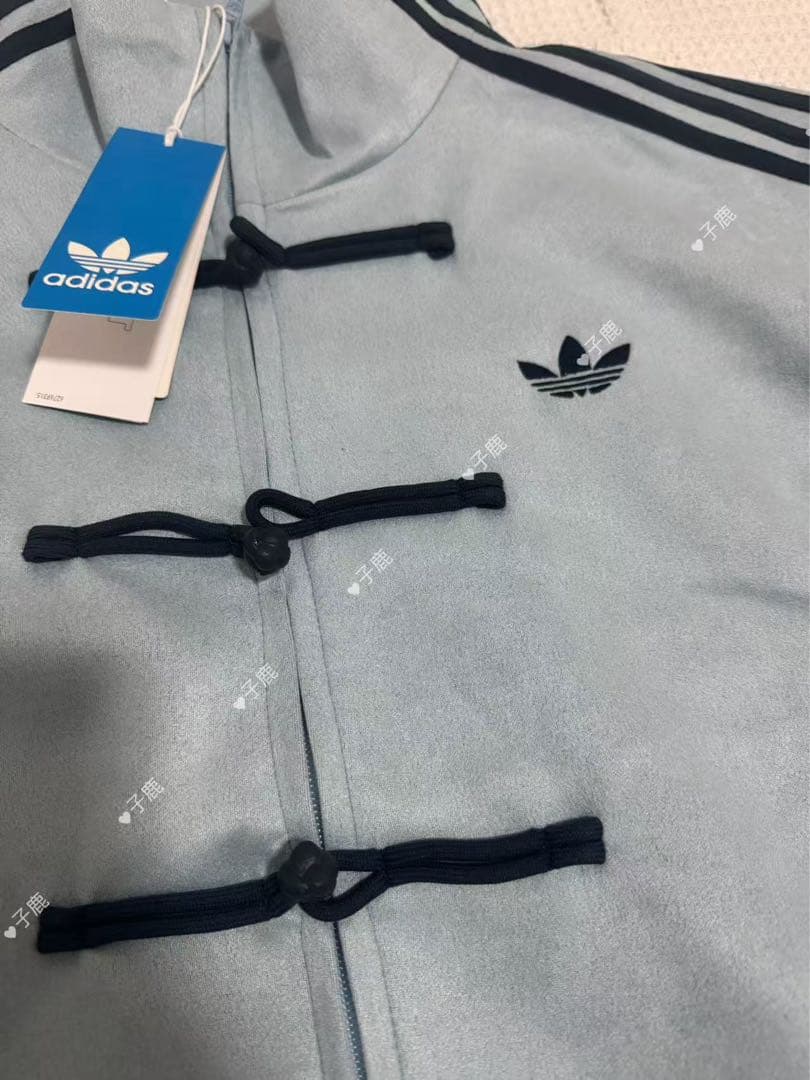 adidasアディダス 中国限定 蛇年トラックジャケットダー みずいろ L