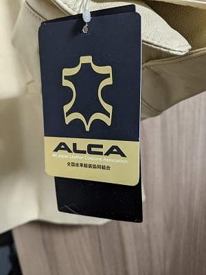 142 新品未使用保管品　タグ付き　ラムレザー　ブルゾン　コート　ノーカラー