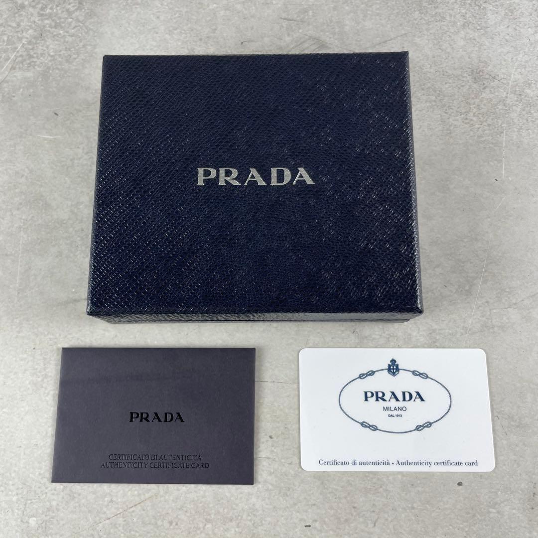 入手困難✨ プラダ 折財布 サフィアーノレザー ロゴプレート オレンジ系