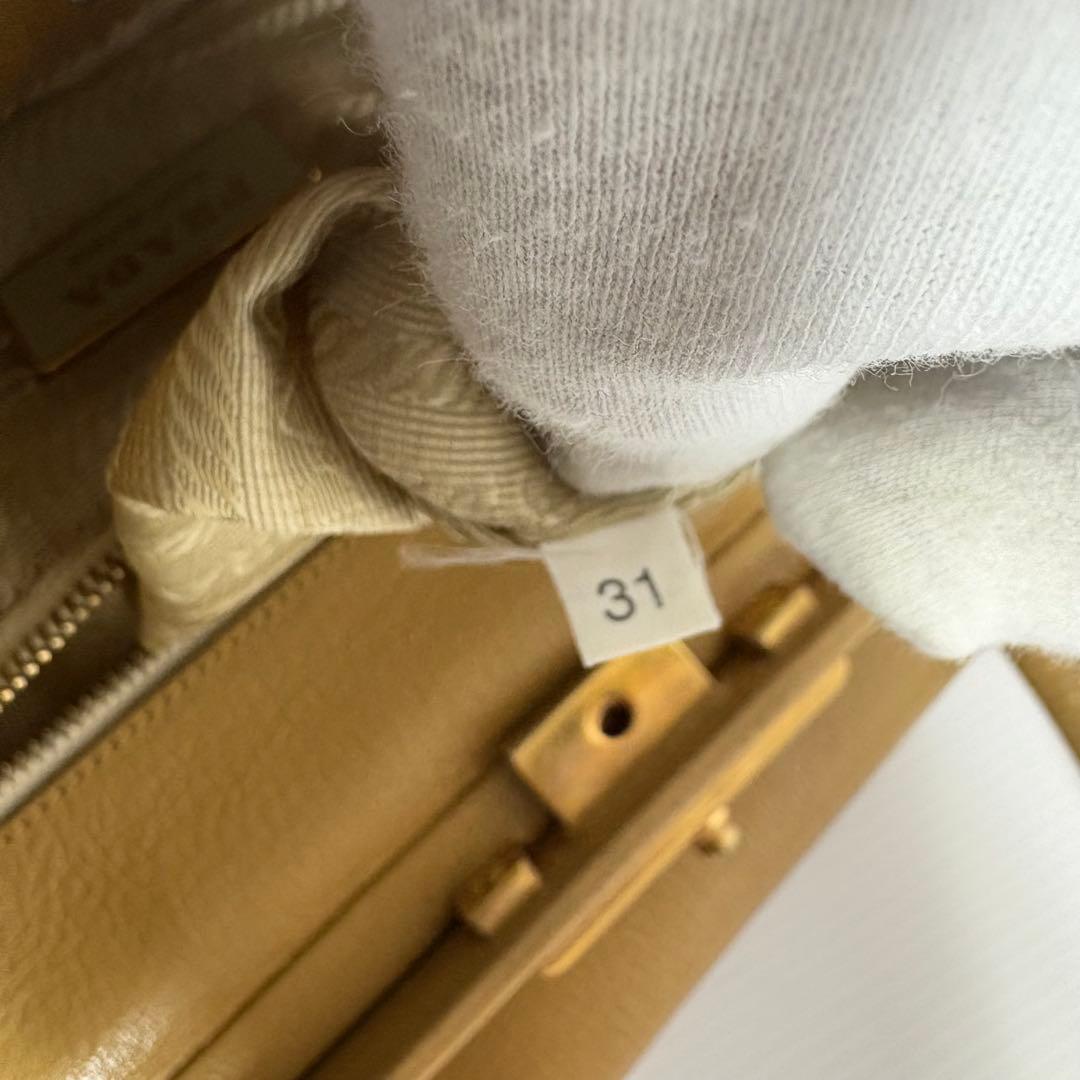 プラダ ドクターバッグ ハンドバッグ オールレザー がま口 チャーム 大容量