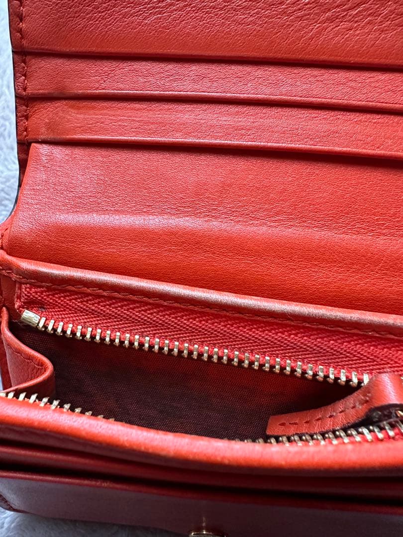 GUCCI ヘビ革 二つ折り財布 オレンジ　パイソン