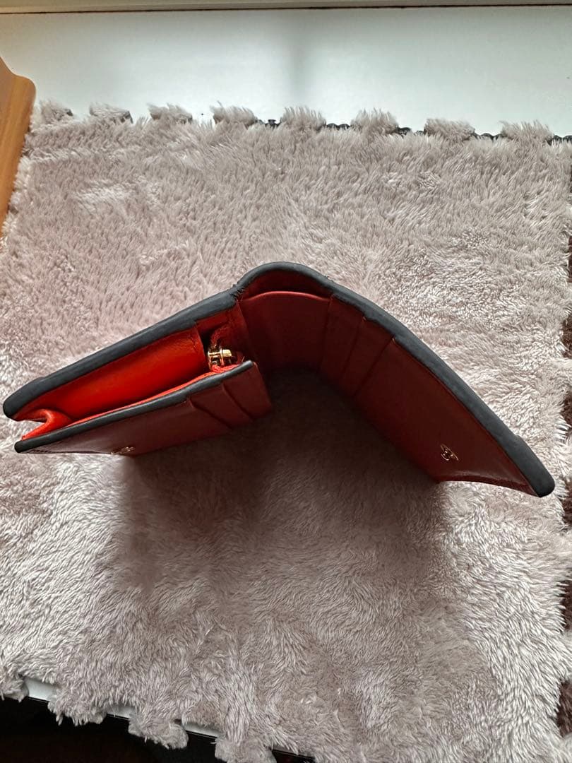 GUCCI ヘビ革 二つ折り財布 オレンジ　パイソン