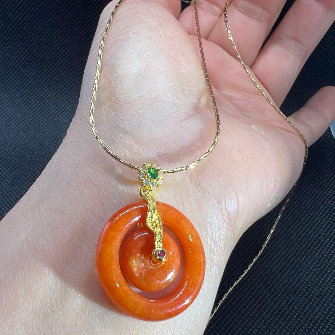 天然オレンジ翡翠の子母平安ボタンのペンダントトップAB1036