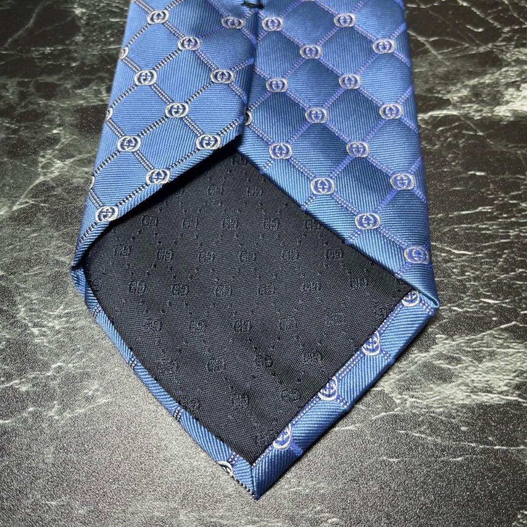 GUCCI グッチロゴ入りブルー系ネクタイ インターロイキング
