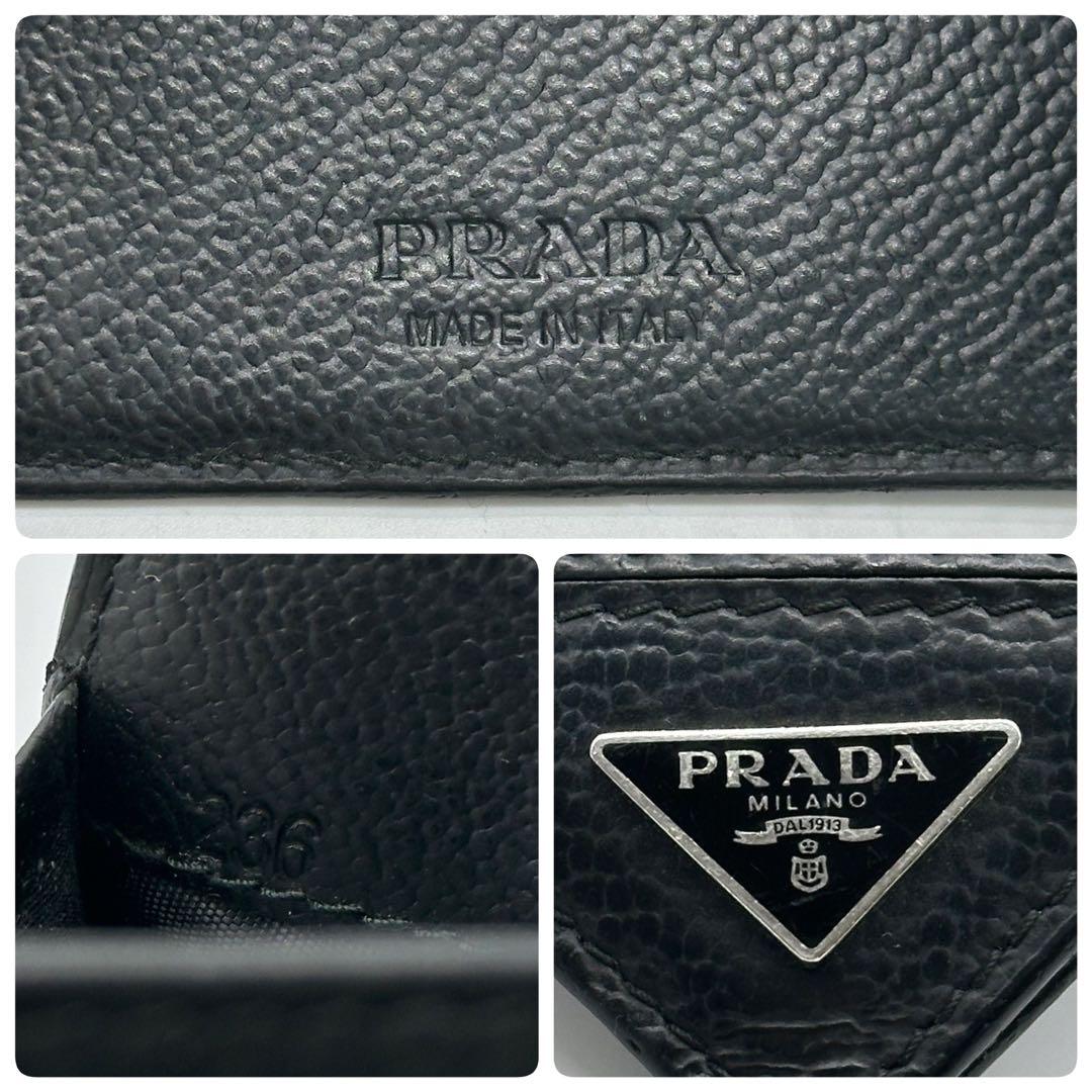 美品　現行　プラダ マネークリップ 二つ 折り財布 シボ革　レザー 三角ロゴ 黒