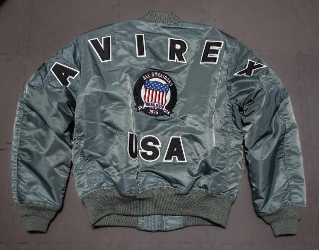 AVIREX 50周年MA-1 フライトジャケットビッグロゴシグネチャーモデル