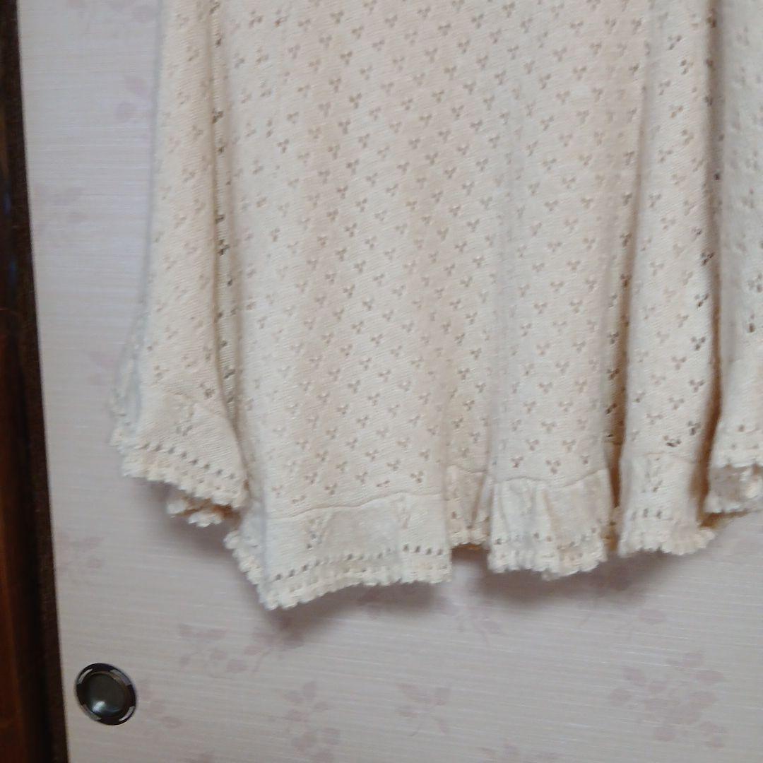 アイボリー 花モチーフ ニット　ポンチョフード付き