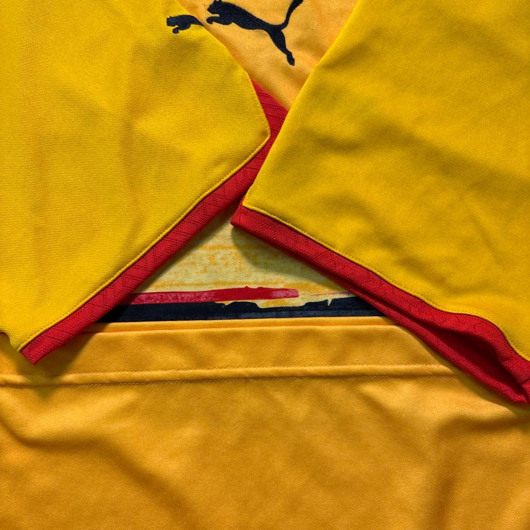 ★8SM2 PUMA 2006 ゲームシャツ　アンゴラ代表　黄色　古着