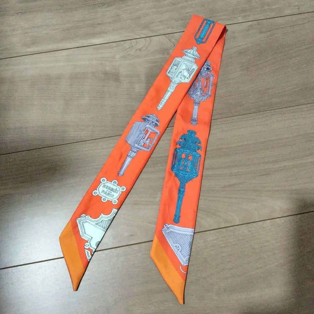 ま HERMES ツイリー オレンジ シルク スカーフ