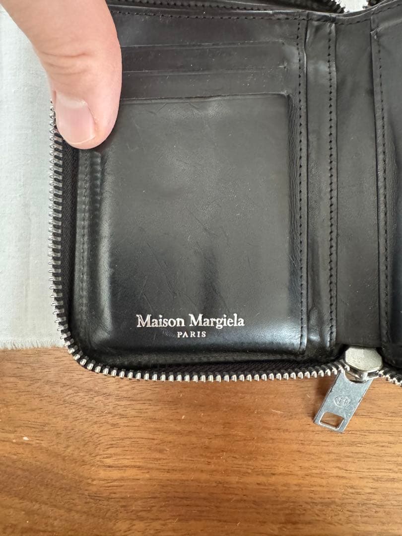 マルジェラ ラウンドジップ折り財布 なりた