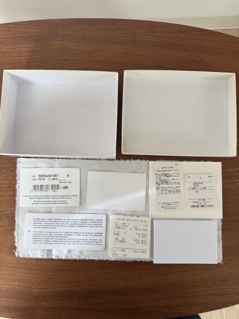 マルジェラ ラウンドジップ折り財布 なりた