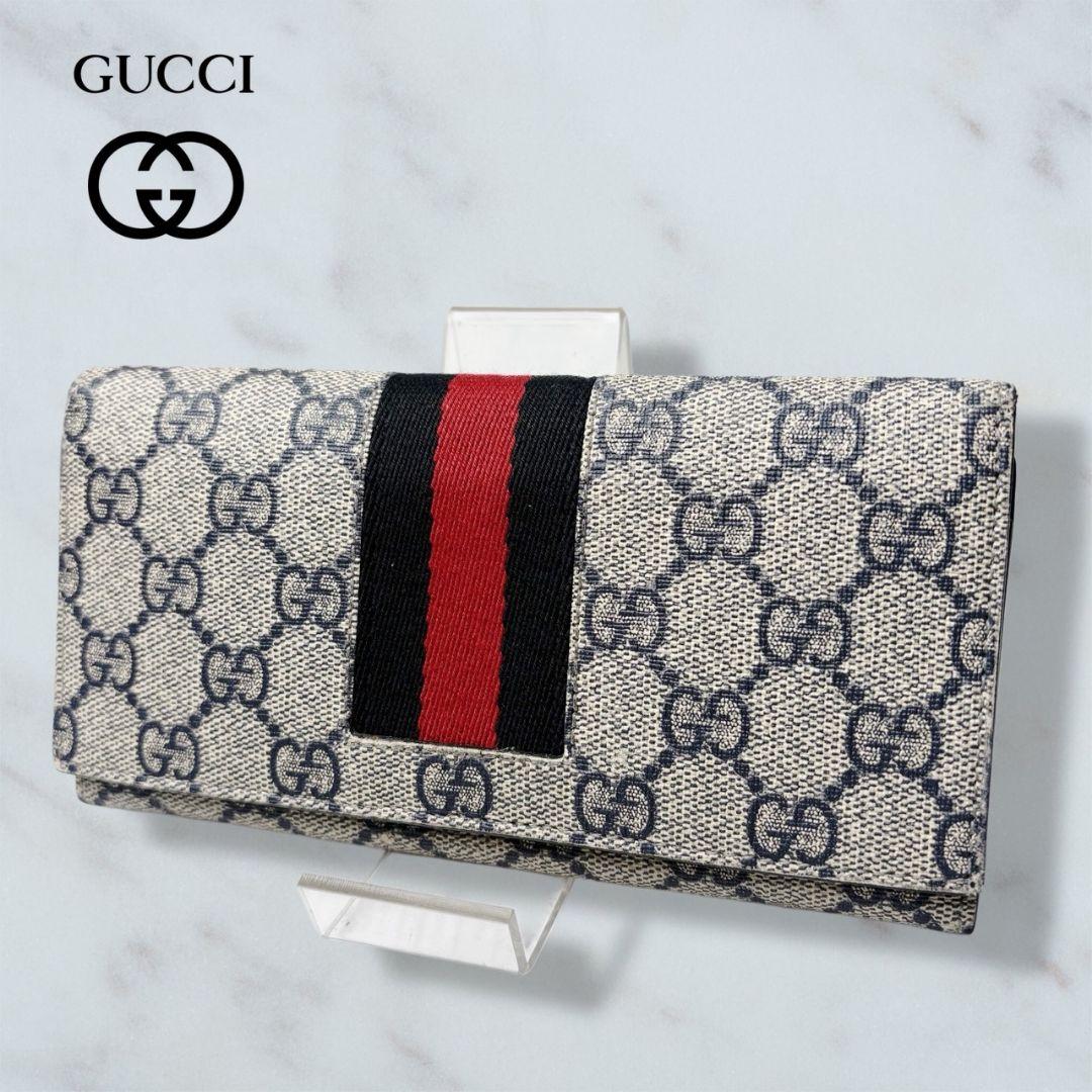 09 GUCCI PVC 二つ折り財布 長財布 シェリーライン k8