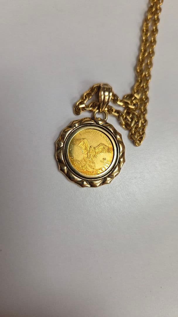 純金ペンダントトップ k24 24金 純金 1/25oz 18金枠 k18