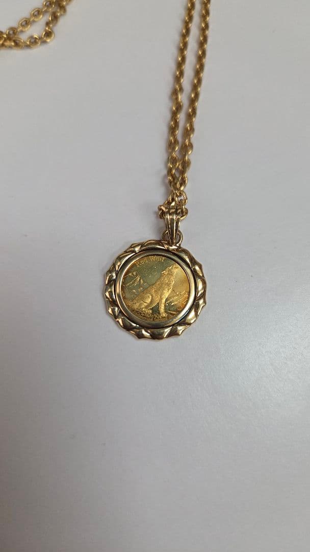 純金ペンダントトップ k24 24金 純金 1/25oz 18金枠 k18