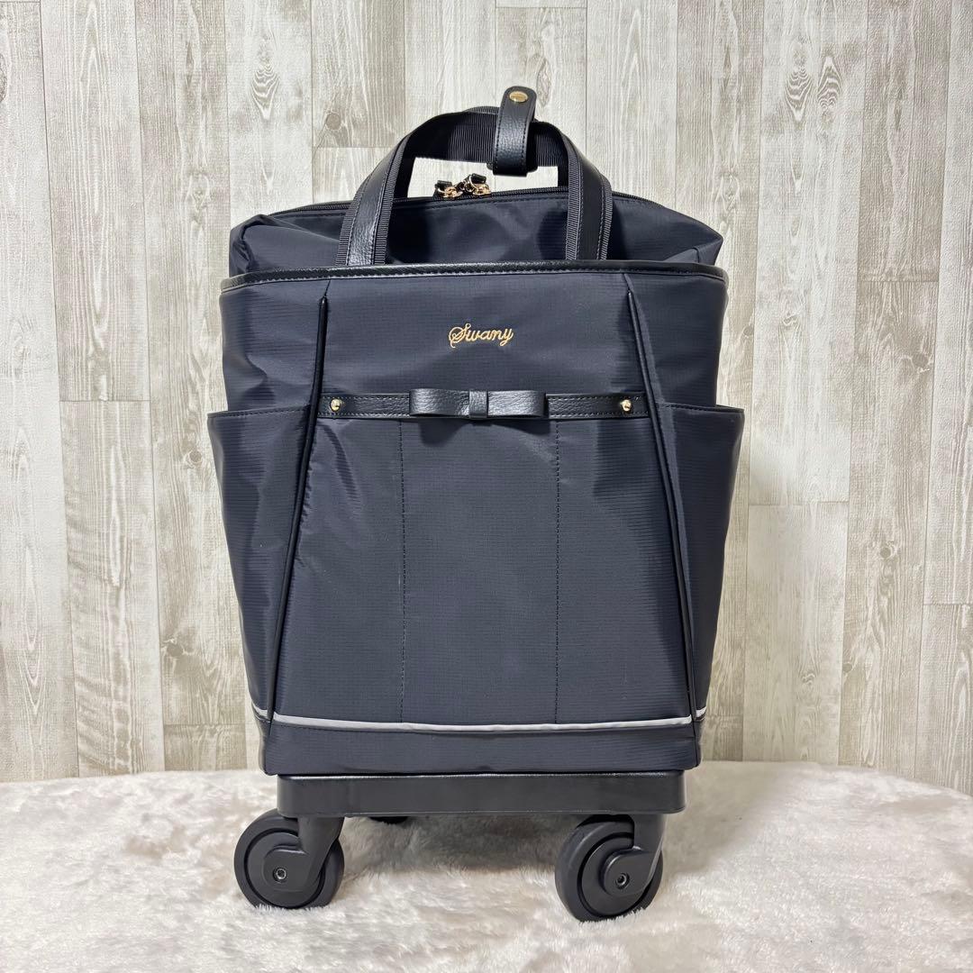 ⭐️美品⭐️スワニー キャリーバッグ 4輪ストッパー付　黒　リボン