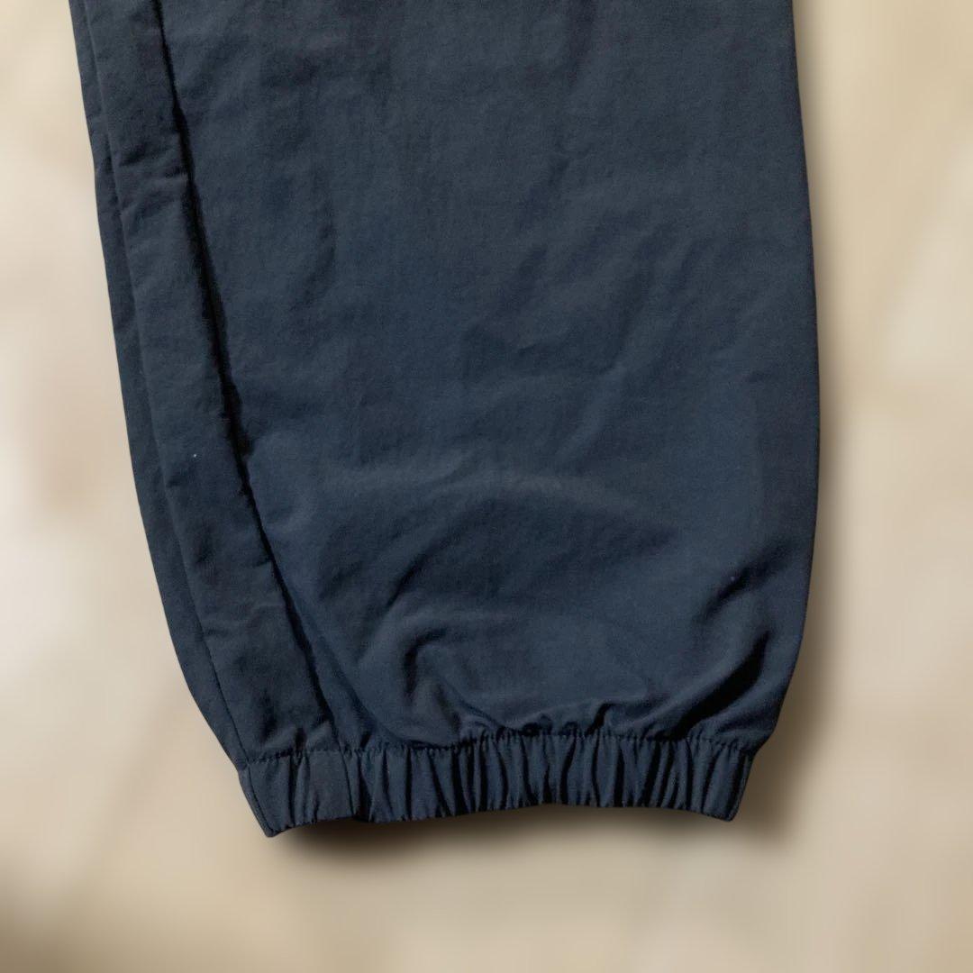 新品未使用タグ付きOAKLEYマットチャコールグレーピステウィンドブレーカーXL