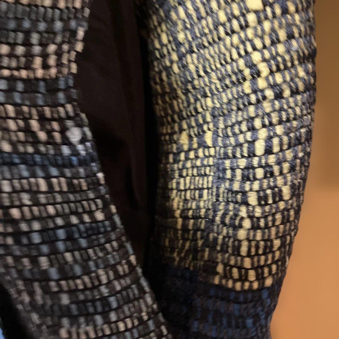 裂織の豪華なコート