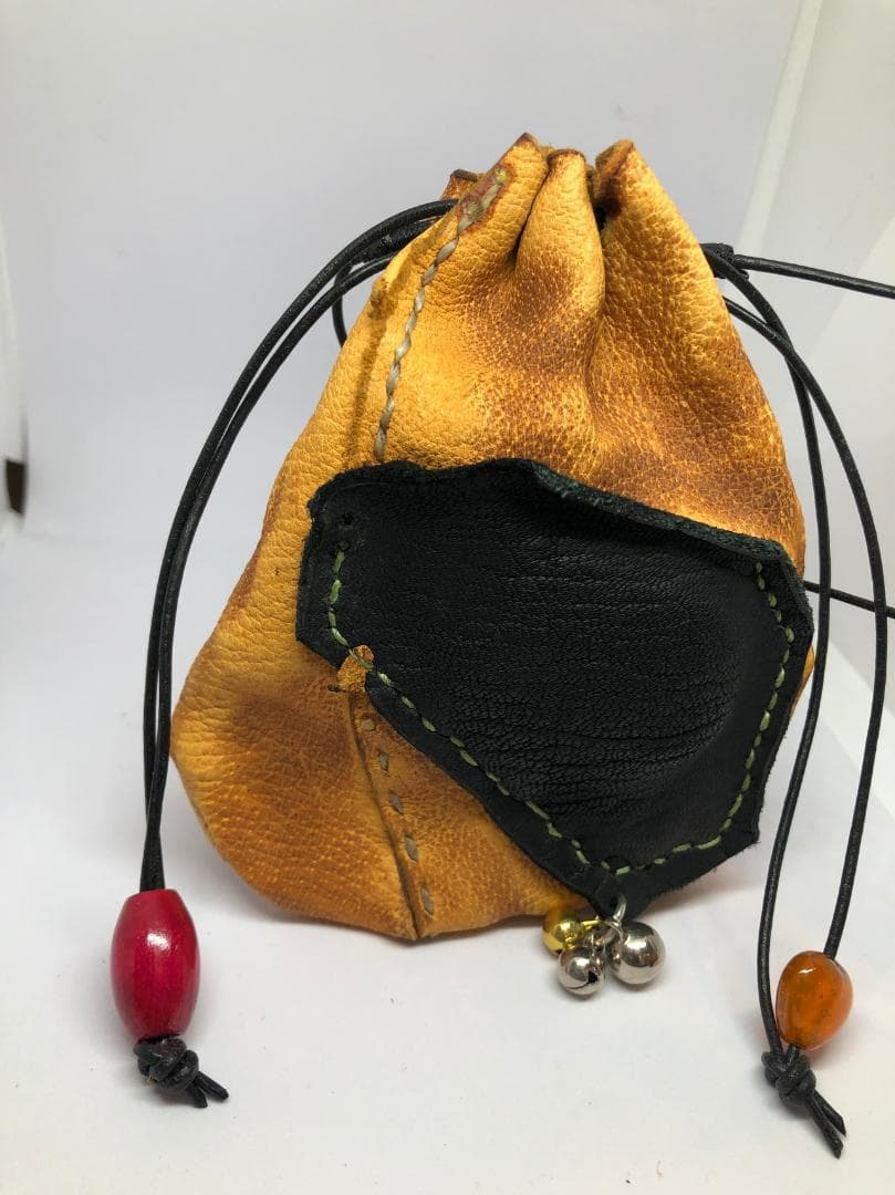 A60.レザー巾着バッグ オレンジと黒