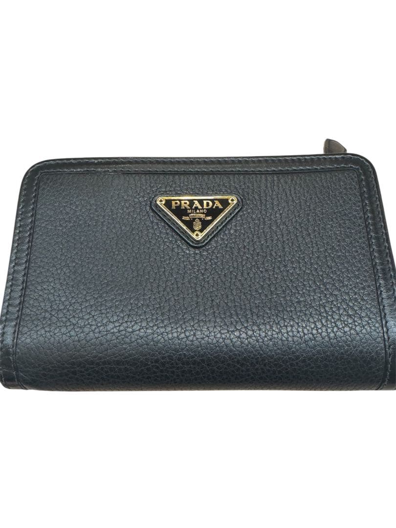 2/15迄限定値下げPRADAプラダ二つ折り財布 ブラック本革金ロゴ三角入りL字